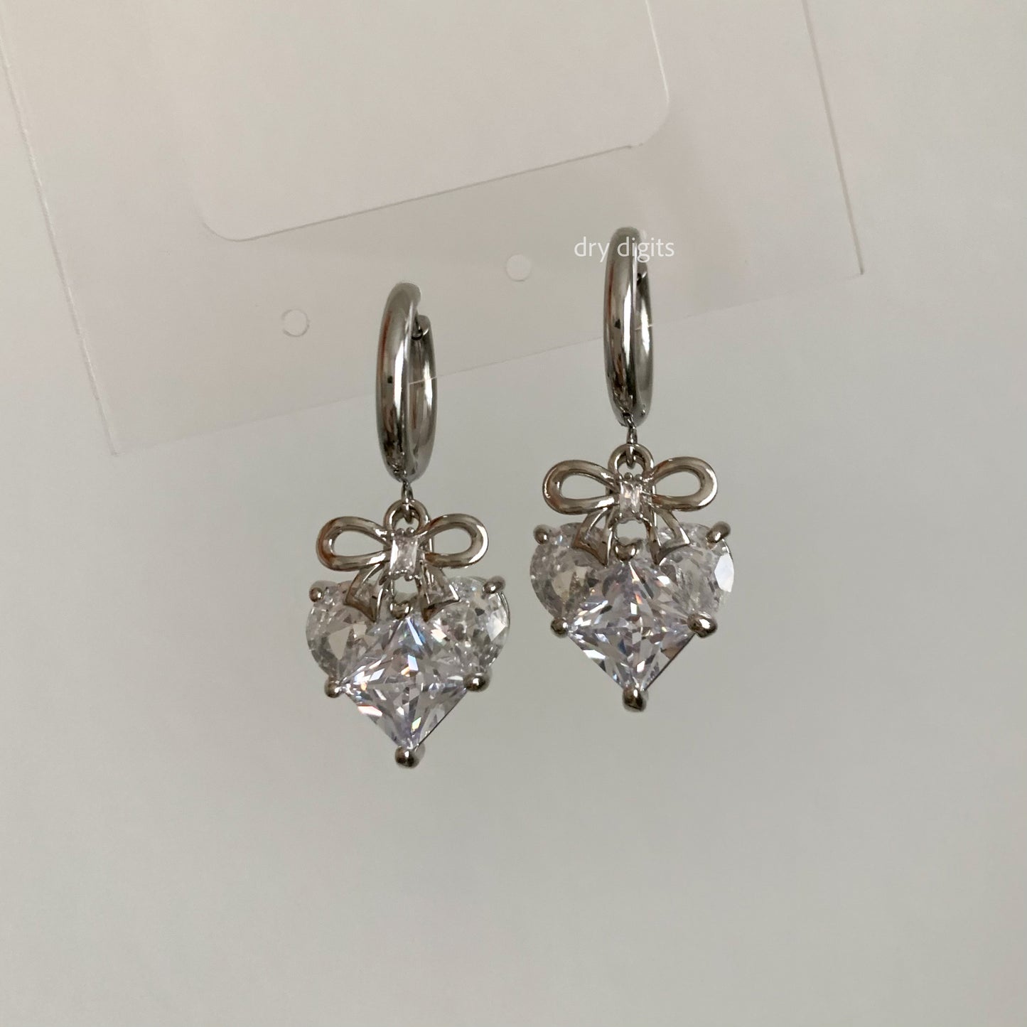 Bow Heart Crystal Hoop Earrings – Silver Dangle Sparkle