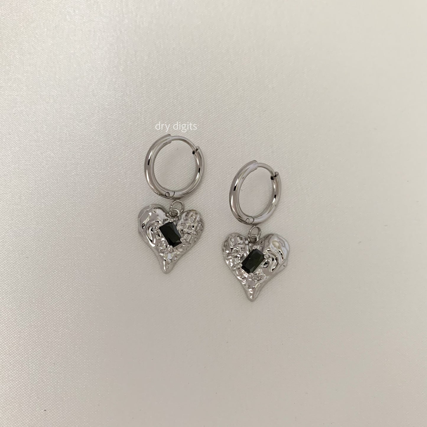 Molten Silver Heart Hoop Earrings – Black Gem Accent Dangles